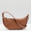 Online Rory Crescent Leather Crossbody Bag Tan